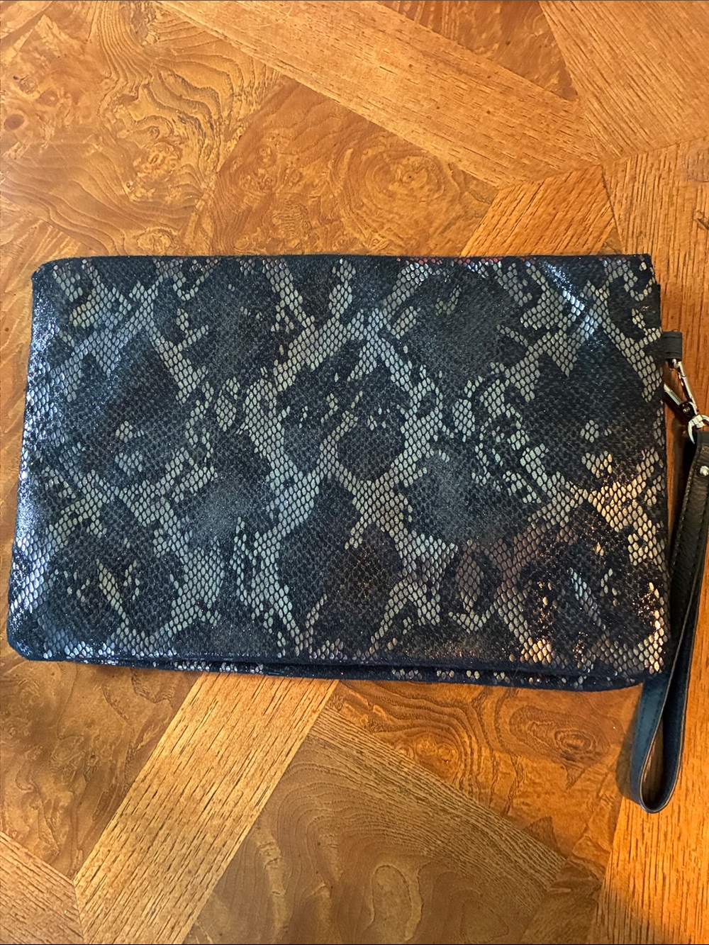 No Boundaries Black and Metallic Snake-Print Wristlet Clutch